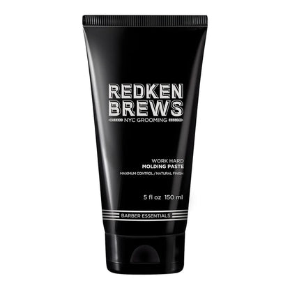 Black tube of Redken Brews molding paste on a white background
