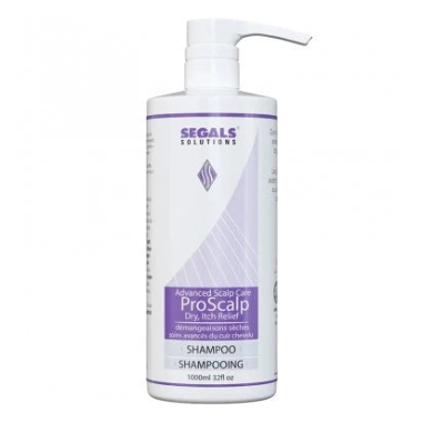 A white plastic pump bottle of Segals Solutions ProScalp Dry, Hair Relief Shampoo on a plain white background.