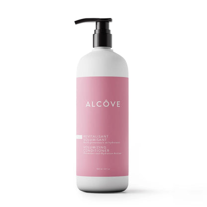 Bottle of Alcove volumizing conditioner with pink label on a white background